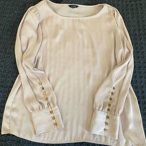 Blush pink blouse with gold buttons on sleeve